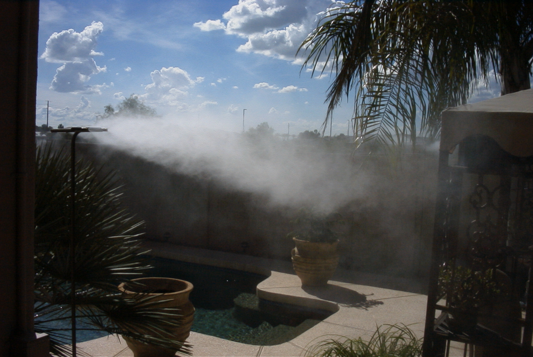 A pool with a lot of smoke coming out it